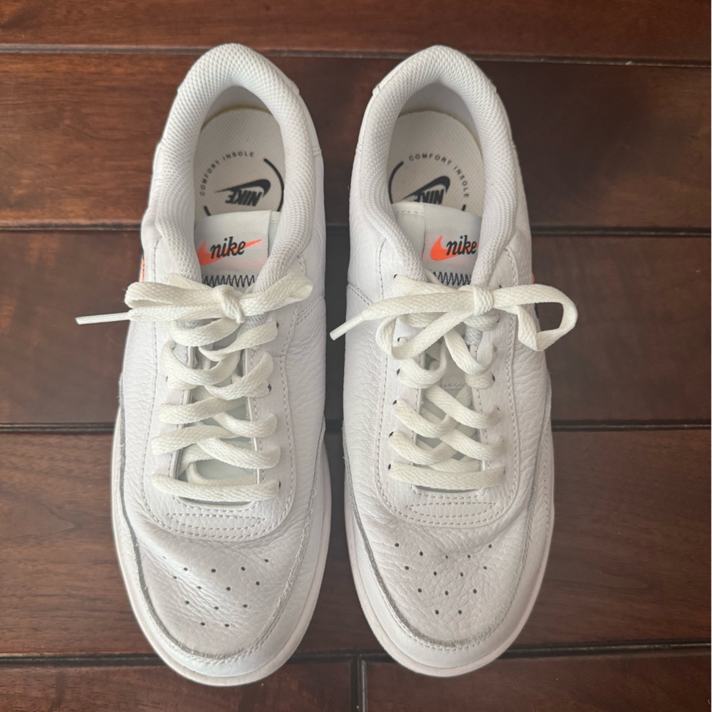 Nike women’s White and Orange Sneakers
